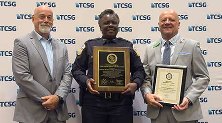 President of Gwinnett Tech, Dr. Cannon and Gwinnett Tech Police Chief, Sandra Pryor, accepting Gwinnett Tech's Police Department Certification for Georgia Law Enforcement