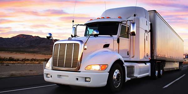 18 wheeler driving on a highway