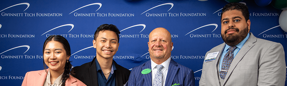 Dr. Cannon with scholarship recipients